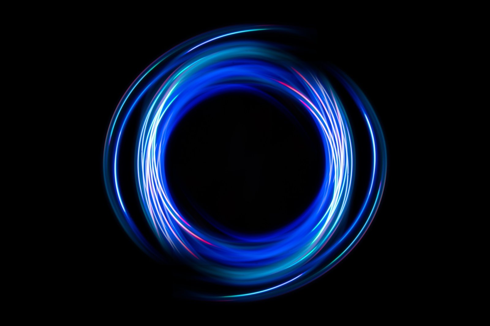 Neon design circle element lights glow and flash technology abstract background.